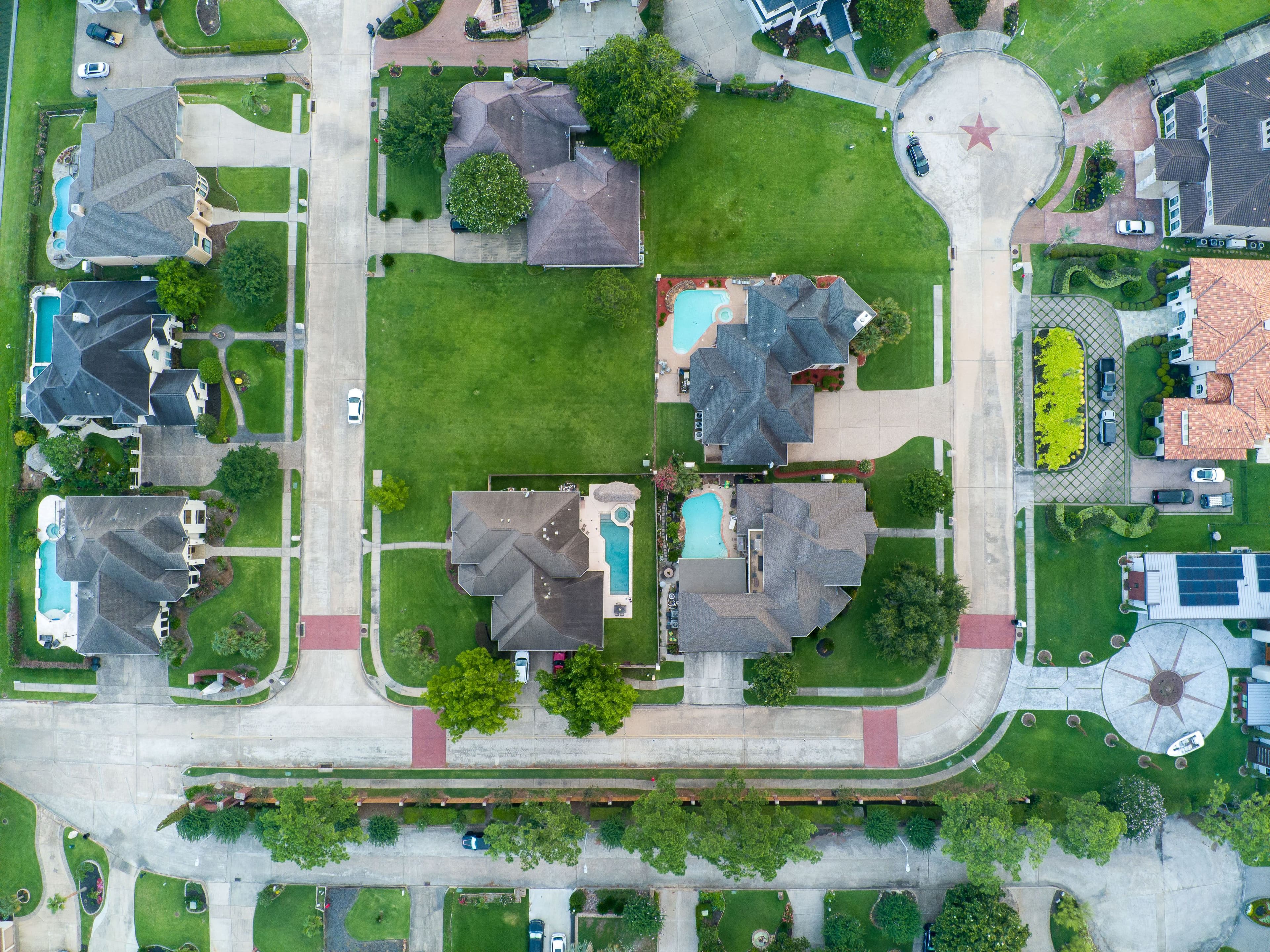 An aerial view of neighborhood homes and their rooflines
