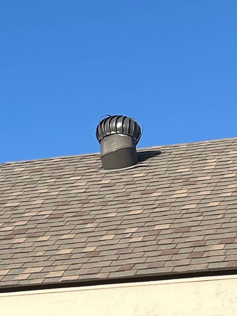Replacement turbine vent on David Baxter's asphalt shingle roof